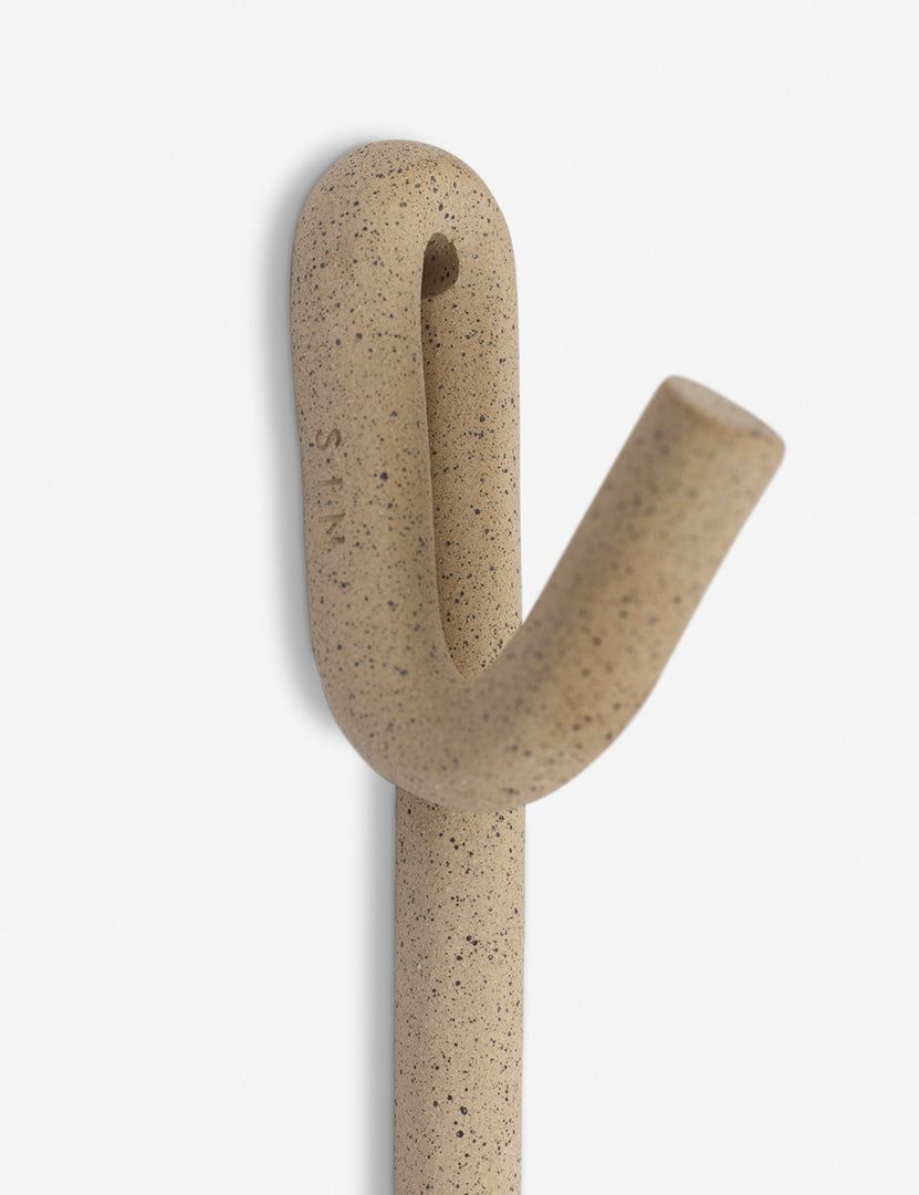 #color::speckled | Close-up of the Cream speckled pattern on the Leggy Long Wall Hook by SIN Ceramics
