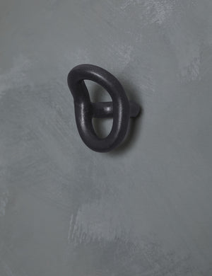 Angled view of the olo black wall hook