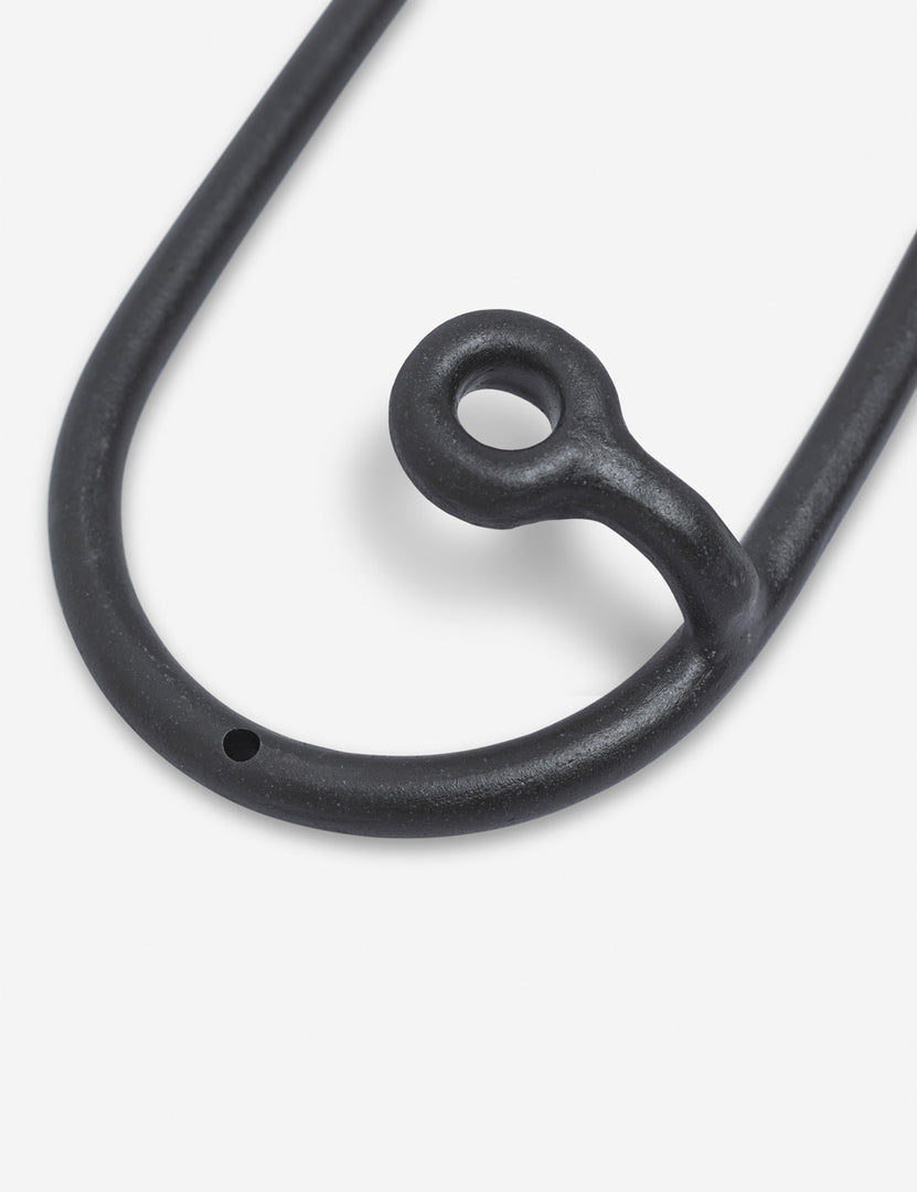 #color::black | Close-up of one of the hangers on the Black Trio Stoneware Coat Rack by SIN Ceramics