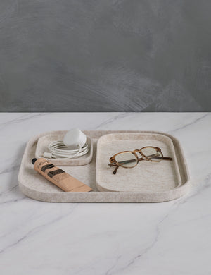 The Tray Trio in stone (Set of 3) by SortJoy with glasses, an airpods case, lip balm, and pens