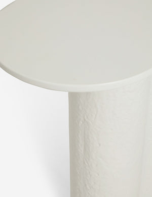 Close-up of the rim and leg of the Tatia White Console Table