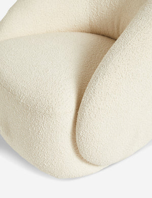 Close-up of the tauri cream boucle swivel chair