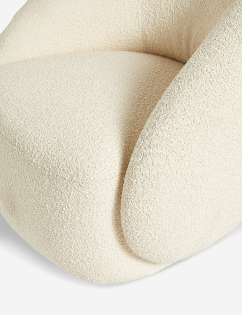 #color::cream | Close-up of the tauri cream boucle swivel chair
