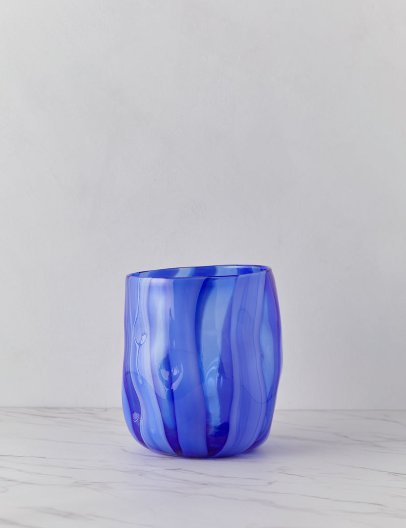 | Umi glass vase with striated wave-like vertical blue lines