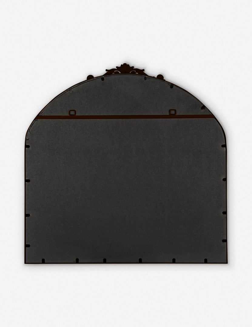 #color::oil-rubbed-bronze | Rear view of the Tulca arched oil rubbed bronze mirror with flat bottom edge and traditional scroll detailing.