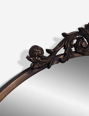 The traditional scroll detailing on the tulca oil rubbed bronze round mirror