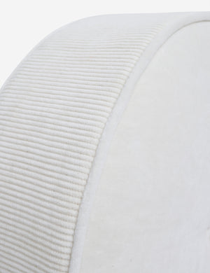 Close up of the piped edges and ribbed siding on the Velvet Disc ivory pillow by Sarah Sherman Samuel