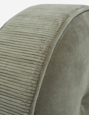 Close up of the piped edges and ribbed siding on the Velvet Disc juniper green Pillow by Sarah Sherman Samuel