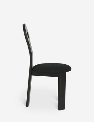 Side view of the Whit black wood sculptural dining chair by sarah sherman samuel