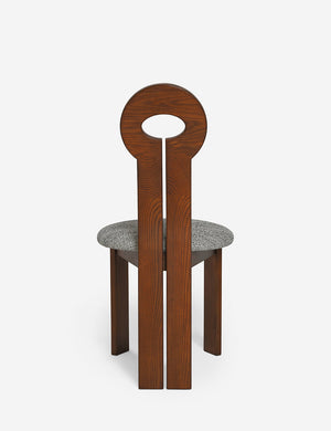 Rear view of the Whit honey wood sculptural dining chair by sarah sherman samuel