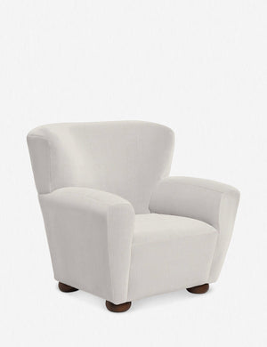 Angled view of the Avery ivory linen accent chair