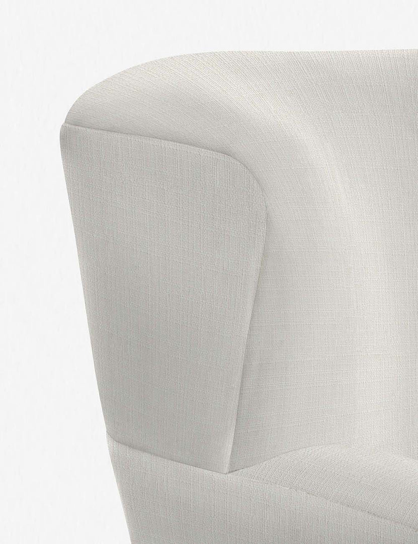 #color::ivory | The stitching on the winged back of the Avery ivory linen accent chair