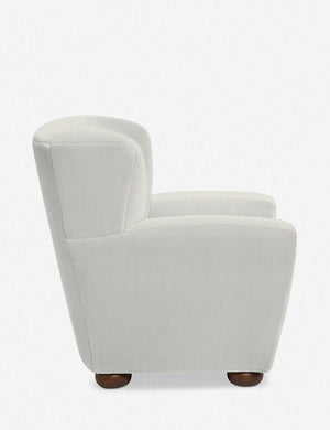 Side of the Avery ivory linen accent chair