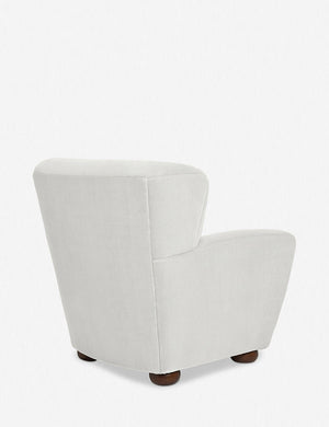 Angled rear view of the Avery ivory linen accent chair