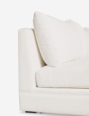 Inner corner of the Winona Ivory Linen armless left-facing sectional sofa