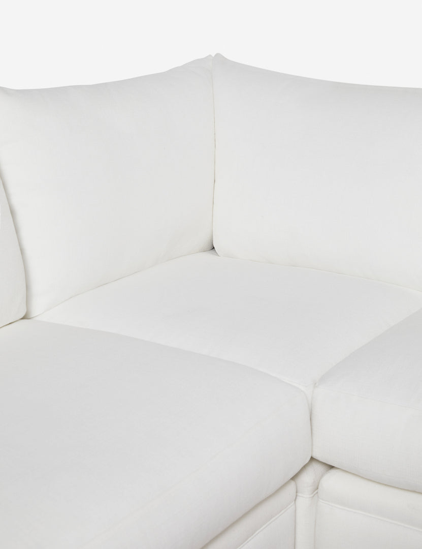 #color::white-performance-fabric #configuration::left-facing | Inner corner of the Winona white performance fabric armless left-facing sectional sofa