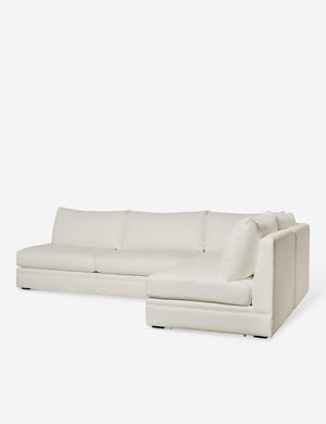 Angled view of the Winona Ivory Performance Fabric armless right-facing sectional sofa