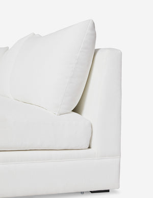 Right-side of the Winona white performance fabric armless right-facing sectional sofa