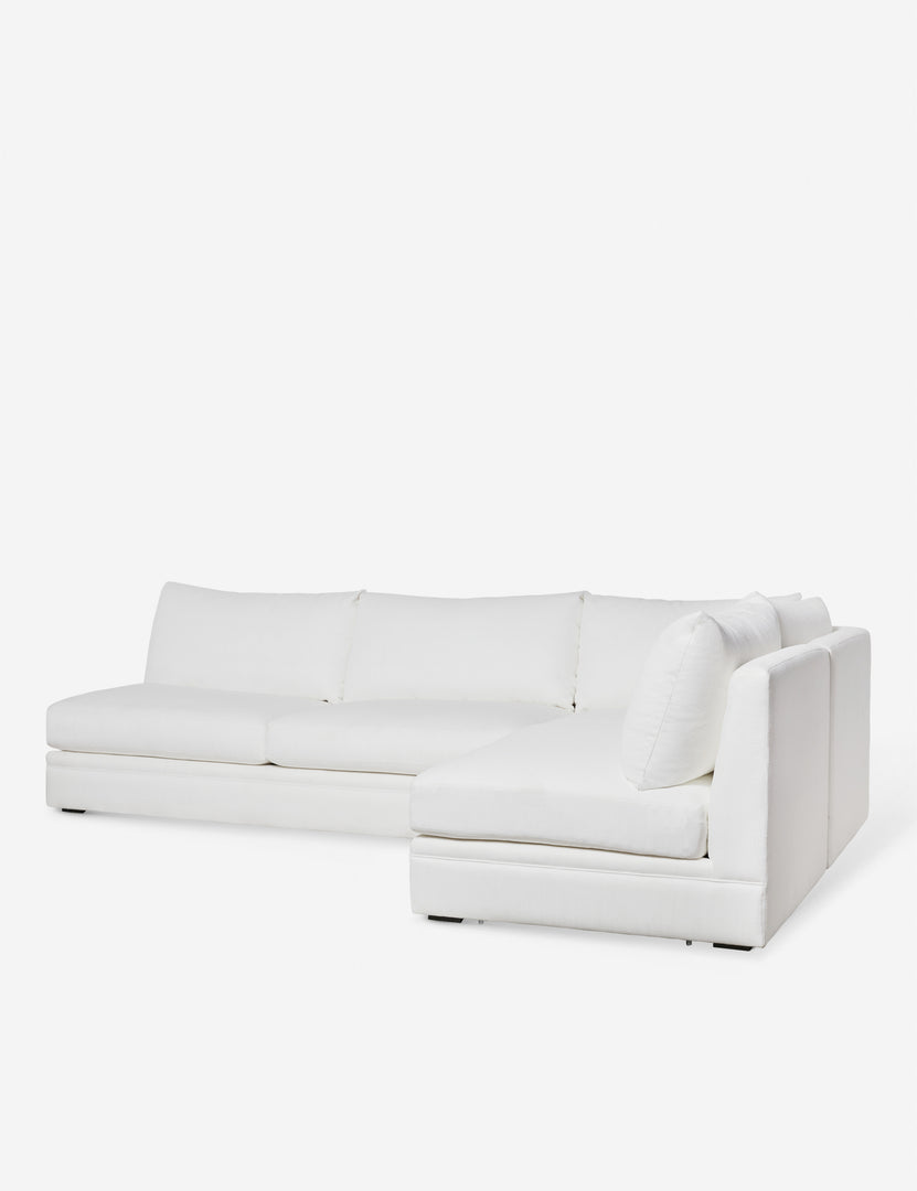 #color::white-performance-fabric #configuration::right-facing | Angled view of the Winona white performance fabric armless right-facing sectional sofa