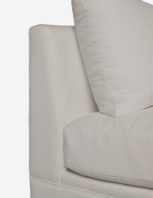 Close-up of the side of the Winona Natural Linen armless sofa