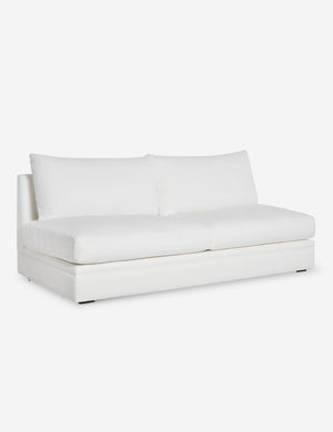 Angled view of the Winona white performance fabric armless sofa