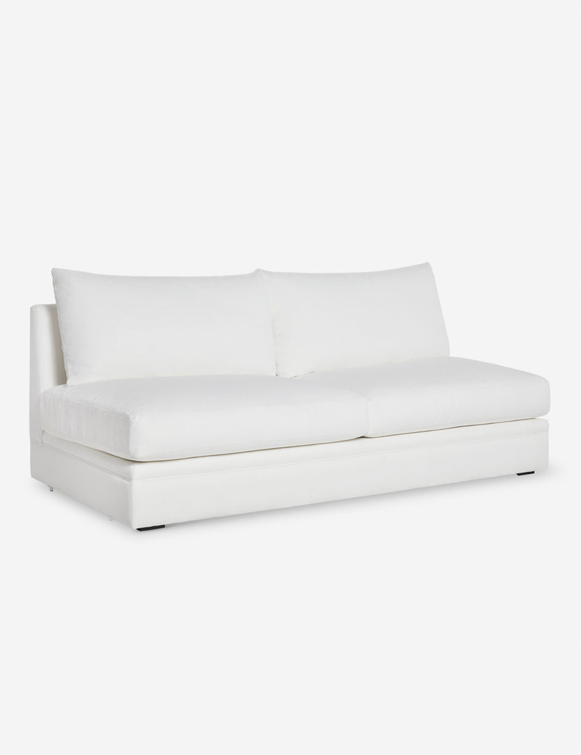#color::white-performance-fabric | Angled view of the Winona white performance fabric armless sofa 