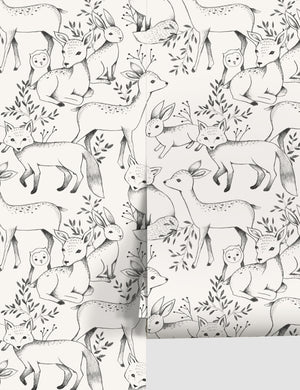Ivory Woodland Wallpaper with black deer, fox, owl, and rabbit designs by Rylee + Cru
