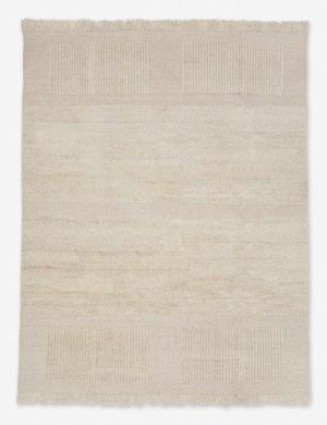 Noemie ivory handwoven rug with contrasting linear detailing