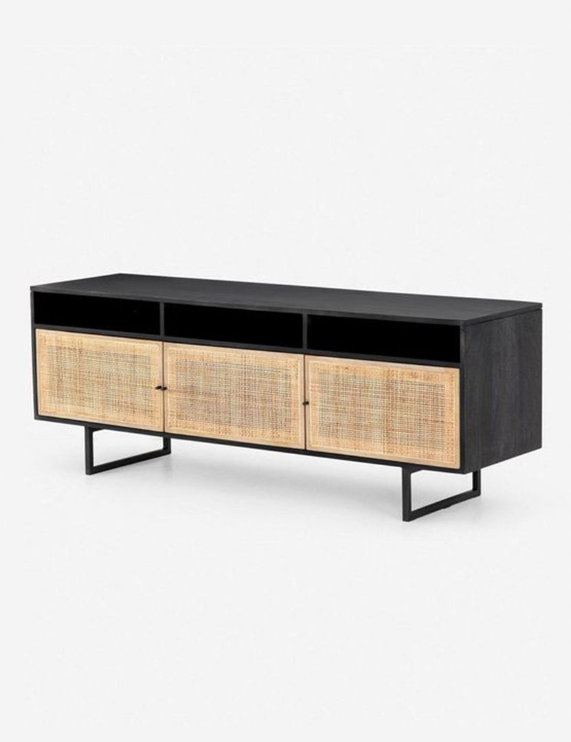 #color::black-and-natural | Angled view of the Hannah black mango wood media console with cane doors.