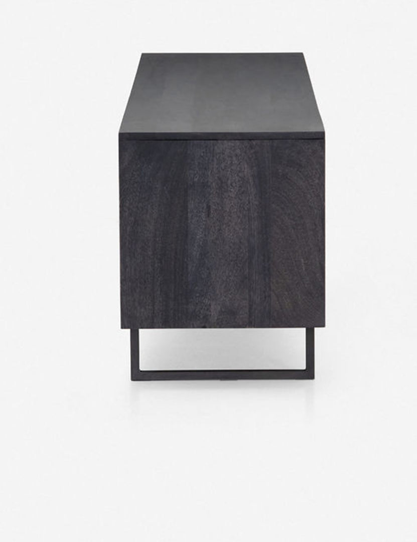 #color::black-and-natural | Side view of the Hannah black mango wood media console with cane doors.