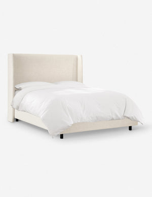 Angled view of Adara cream sherpa upholstered bed.