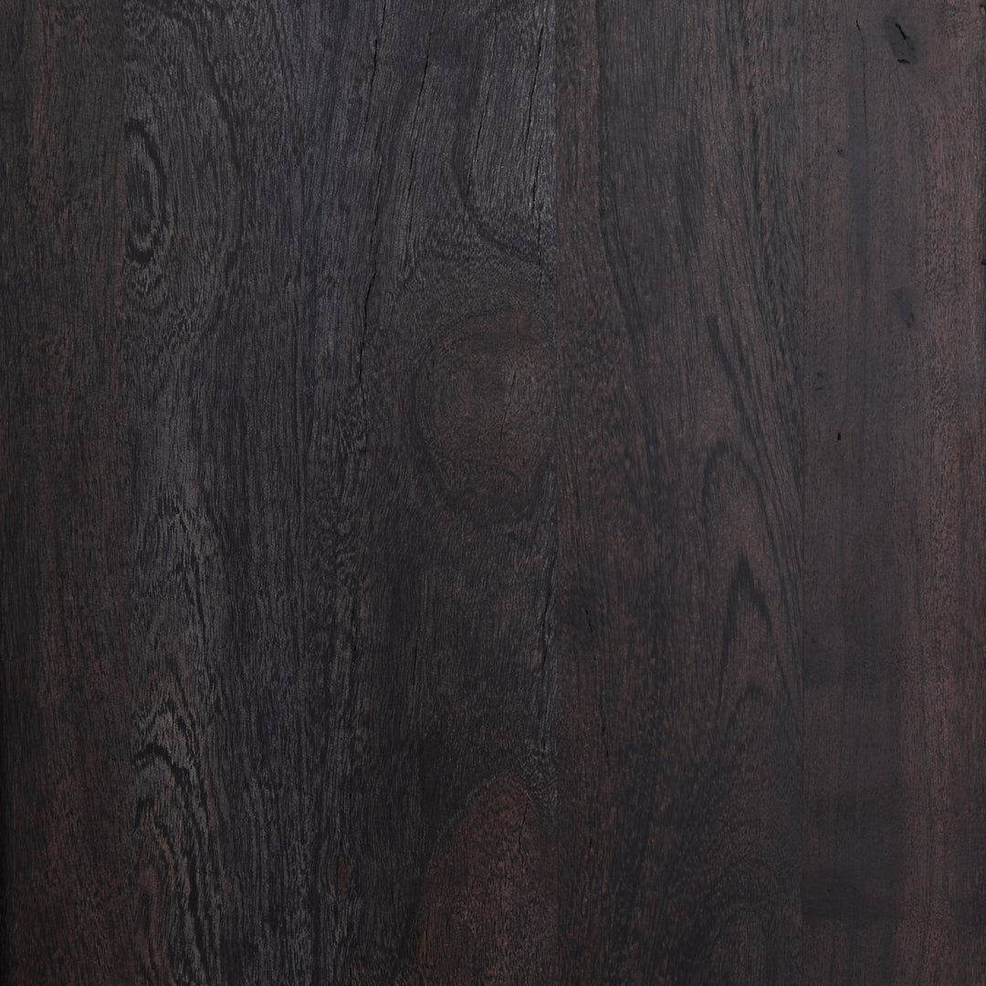 #color::black | Detailed view of the black mango wood on the Hannah black mango wood cabinet with cane doors