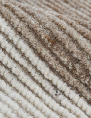 Close-up of the white and brown tones on the Abode geometric two-toned kand-knotted floor rug by Élan Byrd