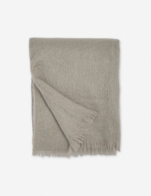 Aimee mohair warm gray wool throw blanket with fringe ends with the corner folded in