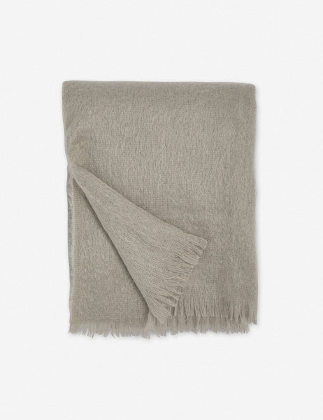 #color::warm-gray | Aimee mohair warm gray wool throw blanket with fringe ends with the corner folded in