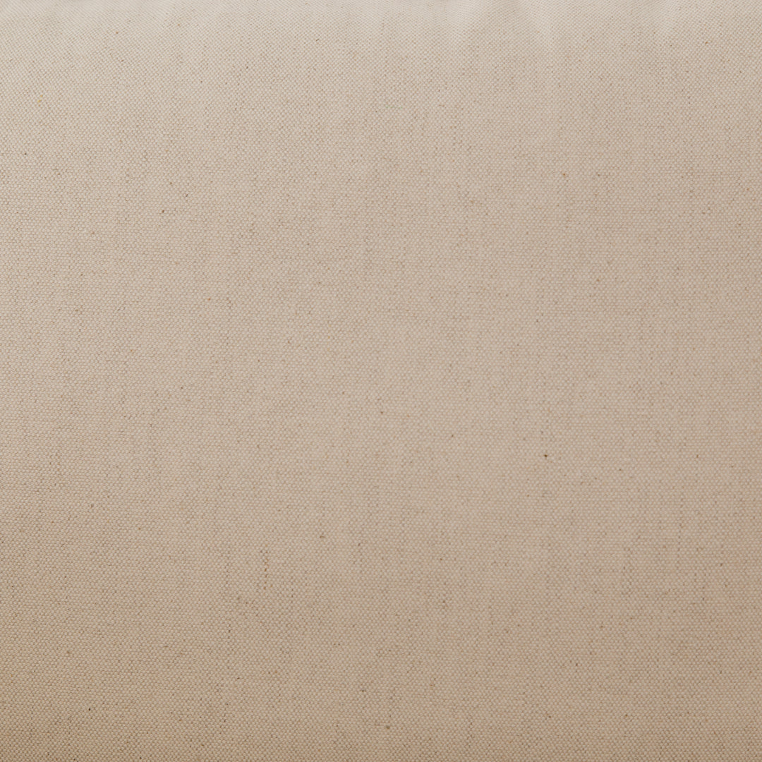 | Detailed view of the cream linen fabric on the Alena accent chair with cream linen cushions and black metal frame