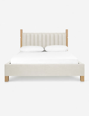 Ambleside Natural Linen upholstered bed with a wood-post bed frame and a headboard with vertical channeling by Ginny Macdonald