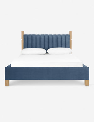 Ambleside Harbor Blue Velvet upholstered bed with a wood-post bed frame and a headboard with vertical channeling by Ginny Macdonald