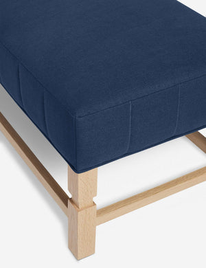 The vertical channeling on the cushion of the Ambleside Dark Blue linen bench