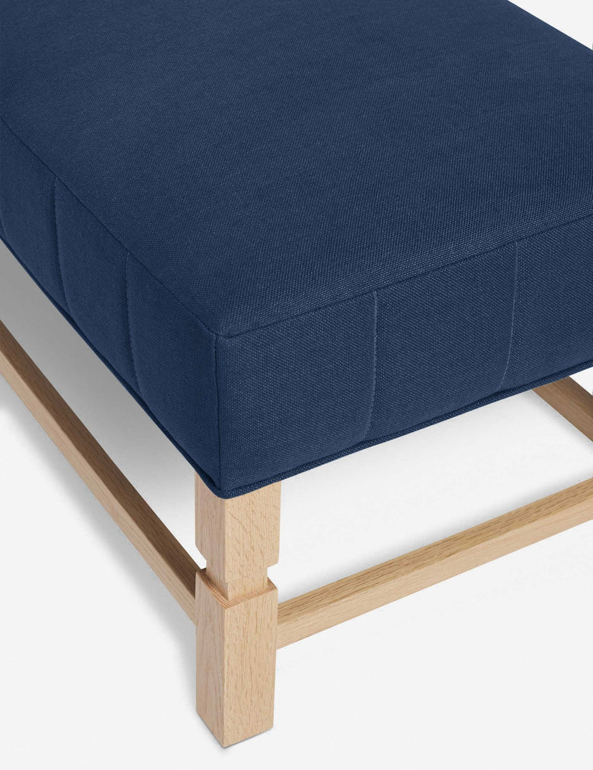 #color::dark-blue | The vertical channeling on the cushion of the Ambleside Dark Blue linen bench