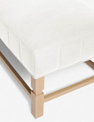 The vertical channeling on the cushion of the Ambleside Oyster white linen bench