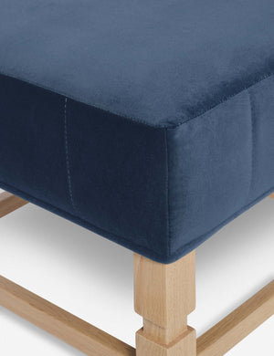 Close-up of the corner on the cushion of the Ambleside Harbor blue velvet ottoman