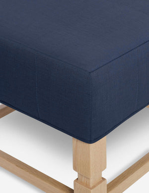 Close-up of the corner on the cushion of the Ambleside Dark Blue linen ottoman