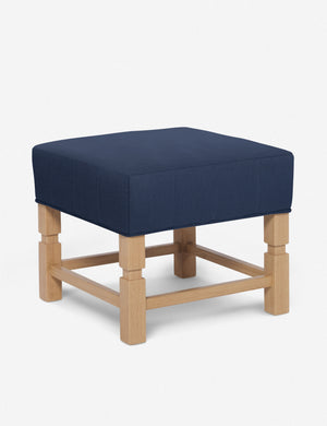 Angled view of the Ambleside Dark Blue linen ottoman