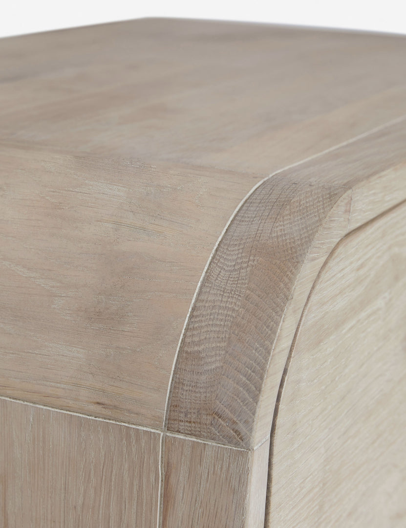 #color::natural | Close-up of the rounded corner on the Brooke 3-drawer white-washed oak dresser