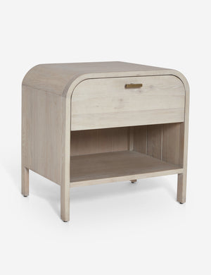 Angled view of the Brooke one drawer whitewashed nightstand