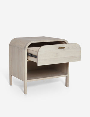 Angled view of the Brooke one drawer whitewashed nightstand with the drawer open