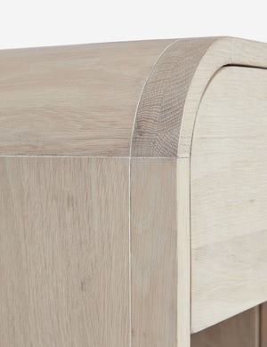 The rounded corner on the top of the Brooke one drawer whitewashed nightstand