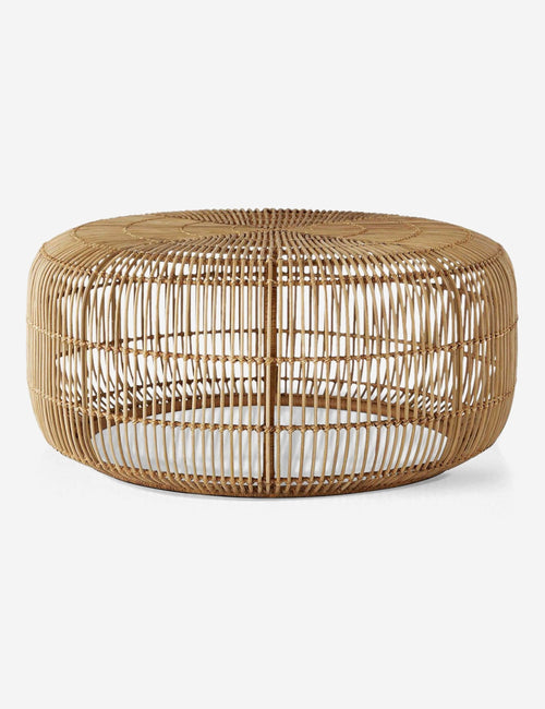 | Amina round coffee table with an open-weave radial design