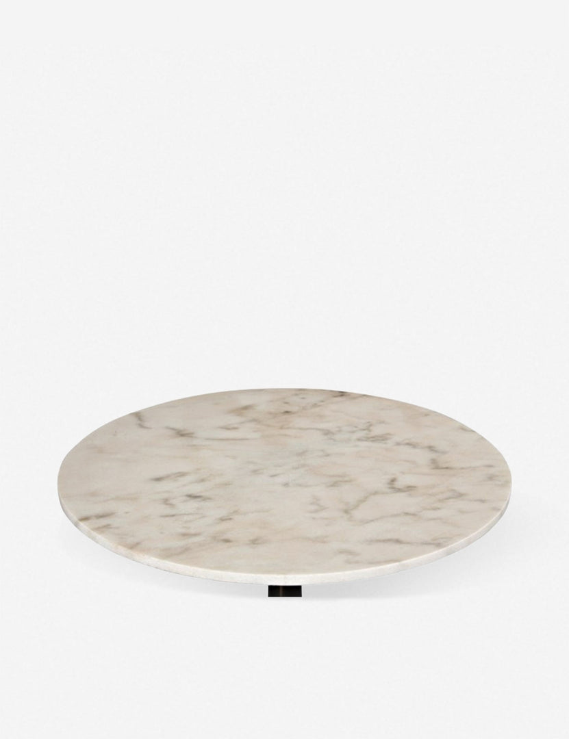 | Singled-out view of the marble table top on the Auriel side table with cast iron base